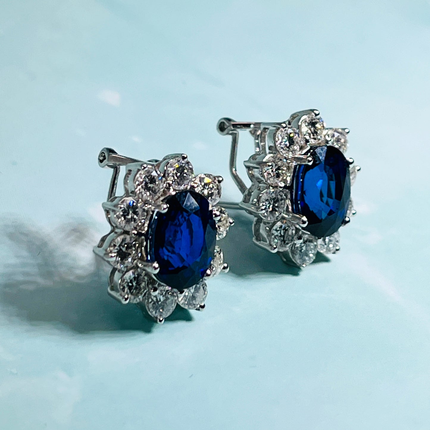 Blue Oval Sapphire Cluster Diamond Earrings