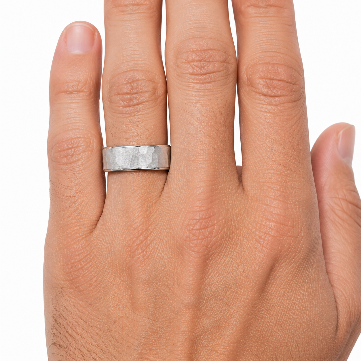 14K white gold 8mm hammered finish men’s wedding band shown on hand