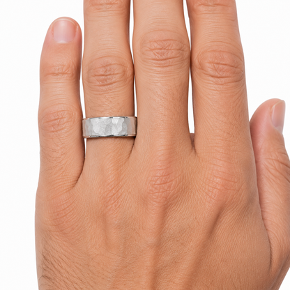 14K white gold 8mm hammered finish men’s wedding band shown on hand