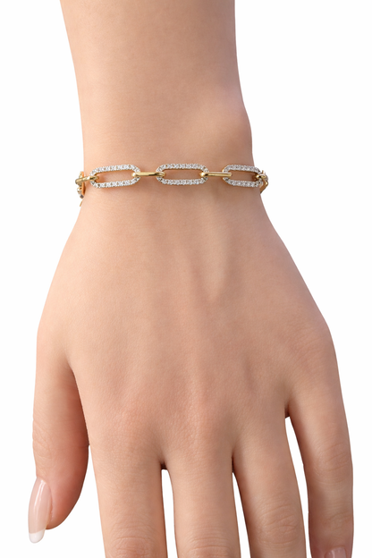 14KT yellow gold graduating paperclip diamond bracelet with 2.53 carats total weight natural diamonds worn on wrist