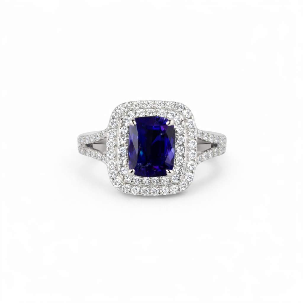 18KT Gold Halo Ring set with Blue Sapphire center stone and Diamonds