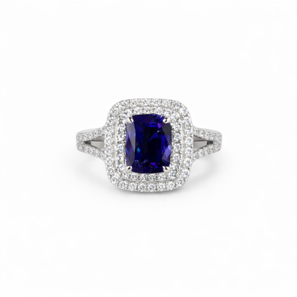 18KT Gold Halo Ring set with Blue Sapphire center stone and Diamonds