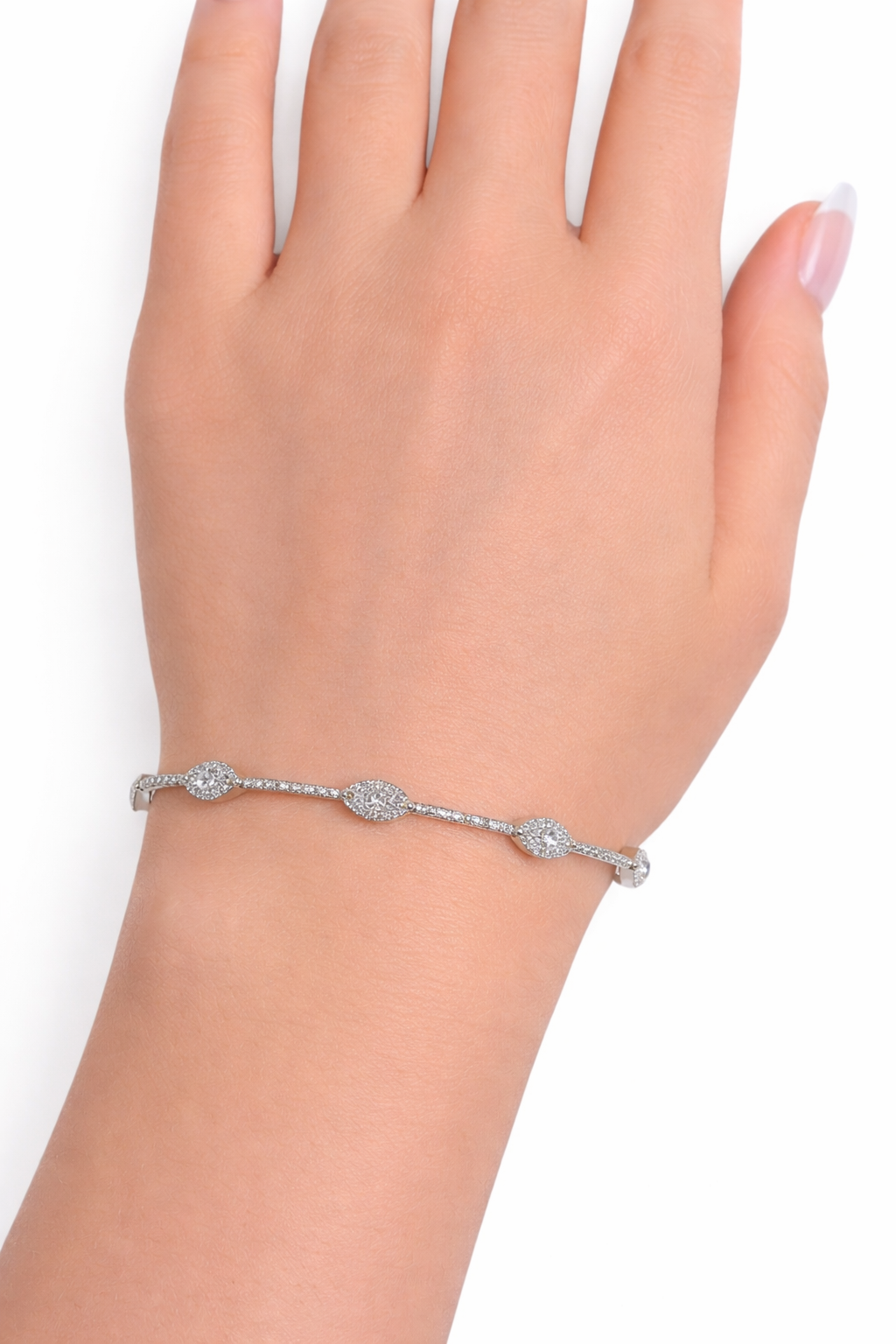 14k white gold diamond marquise station bracelet on wrist with pavé diamonds Huntington Beach Orange County
