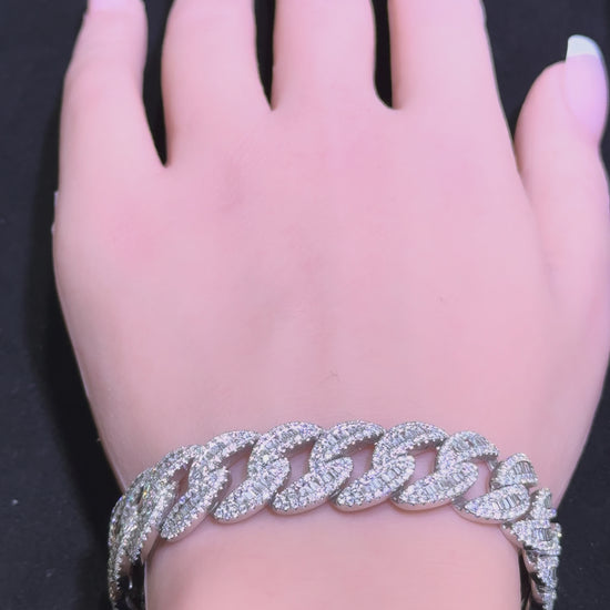Video of white gold diamond Cuban link bracelet on wrist showing sparkle and movement in Huntington Beach Orange County