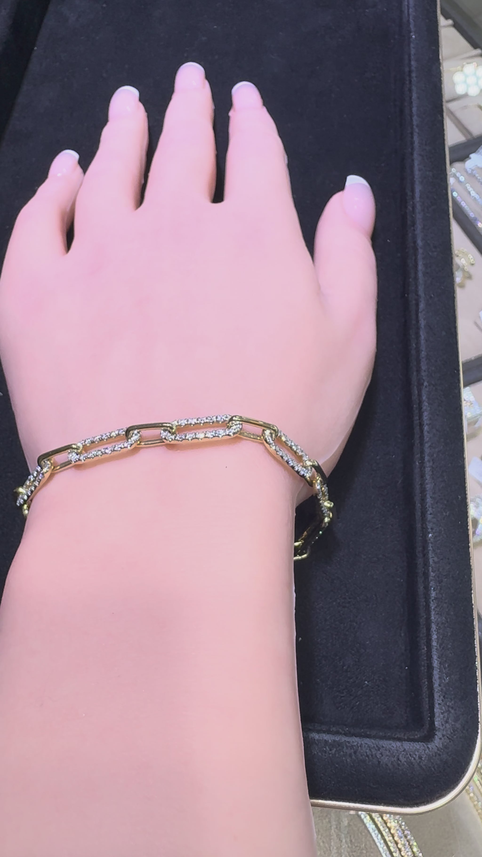 Video of 14KT yellow gold graduating paperclip diamond bracelet featuring 2.53 CTW natural diamonds on wrist
