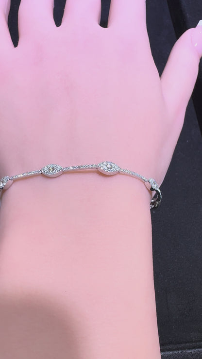 14k white gold diamond marquise station bracelet sparkling on wrist with pavé diamonds Huntington Beach Orange County