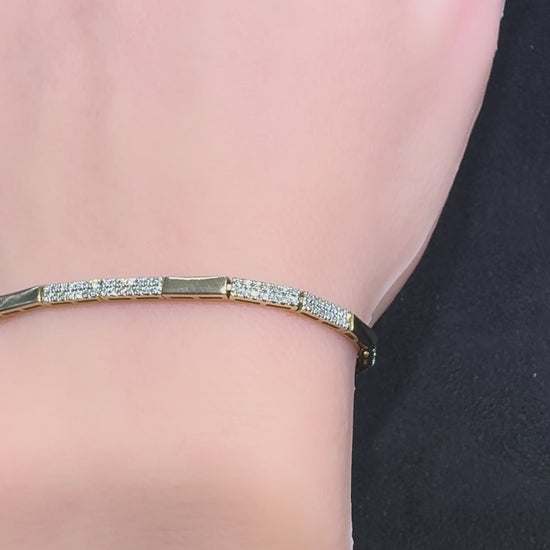 Video showcasing a 14 karat yellow gold diamond bar bracelet with natural diamonds from Isabella’s Fine Jewelry in Huntington Beach California