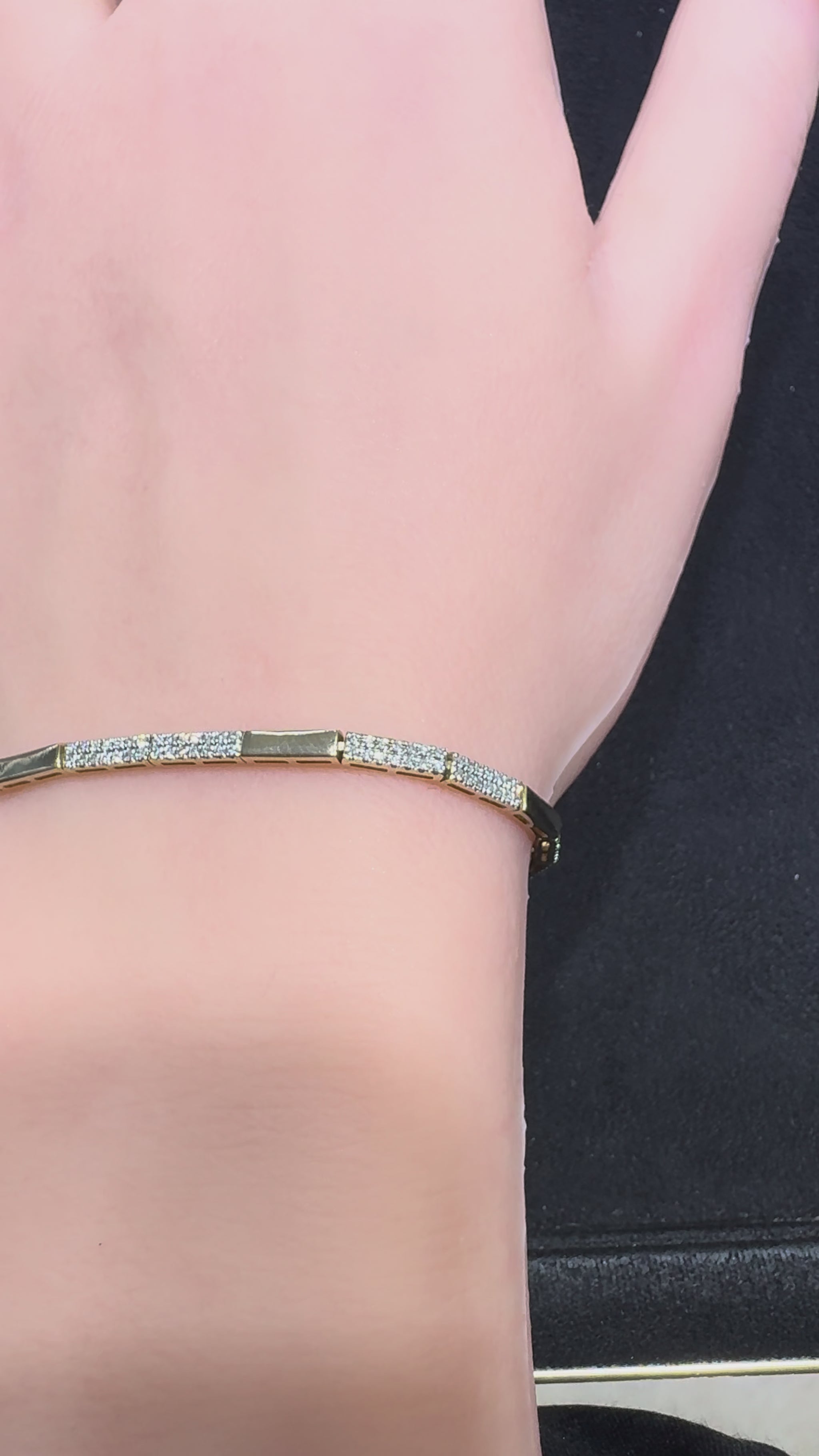 Video showcasing a 14 karat yellow gold diamond bar bracelet with natural diamonds from Isabella’s Fine Jewelry in Huntington Beach California