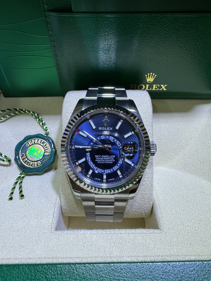 Stainless steel Rolex Sky-Dweller with blue dial and fluted bezel complete set Orange County