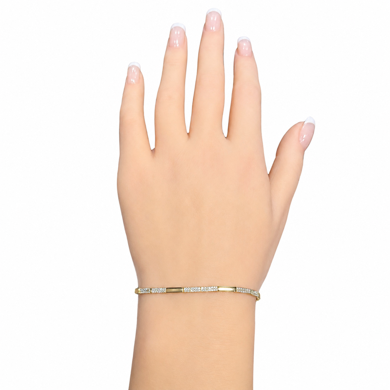 Close-up of a 14 karat yellow gold diamond bar bracelet with natural diamonds on wrist at Isabella’s Fine Jewelry in Huntington Beach California