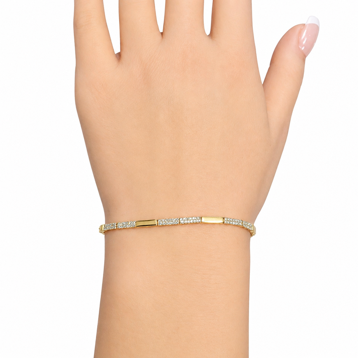 14 karat yellow gold diamond bar bracelet with natural diamonds shown on wrist at Isabella’s Fine Jewelry in Huntington Beach California